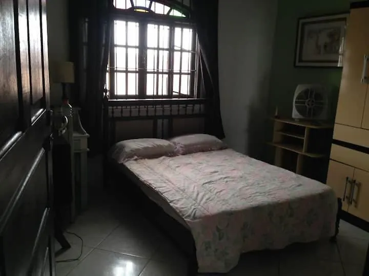 Quarto em Acomodações Particulares Hostel Casa De Praia Suites Cabo Frio